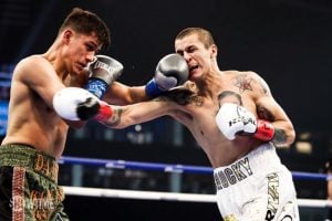 Danny Roman outclasses Moises Flores in junior featherweight title fight