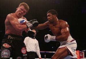 Anthony Joshua rallies to score 7th-round TKO of Alexander Povetkin in heavyweight title tilt