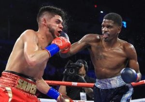 Maurice Hooker climbs off canvas to stop Alex Saucedo in Round 7 of thrilling title defense