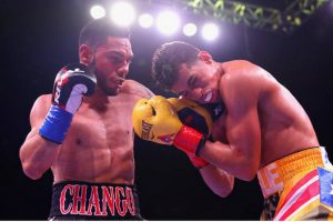 Cancio survives early knockdown to shock Machado, takes WBA title