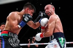Roman beats Doheny in 12-round war to unify titles