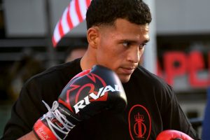 Benavidez regains WBC title with stoppage of Dirrell