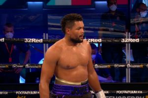 Joyce demolishes Wallisch in three rounds