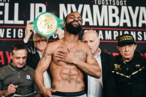 Haney, Russell Jr. Exchange War Of Words; Devin Declares Fight Contract Is Delivered