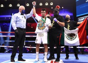 Jose Zepeda lethargically cruises by Hank Lundy on Taylor-Ramirez undercard