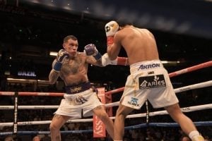 Jaime Munguia outworks, outpoints game Gabriel Rosado in 12-round barnburner
