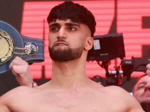 Adam Azim Controls Enock Poulsen, Gets KO Win Due To Injury in Fifth