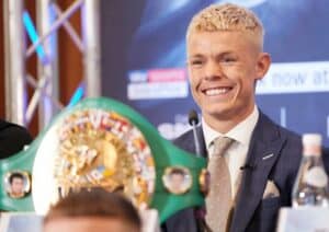 Charlie Edwards standing at the door of destiny, with Thomas Essomba on the other side