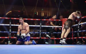 Floored Johnny Fisher survives Dave Allen with controversial win