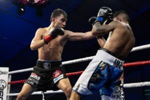 Omar Trinidad routs Mike Plania as Rafael Espinoza looks on