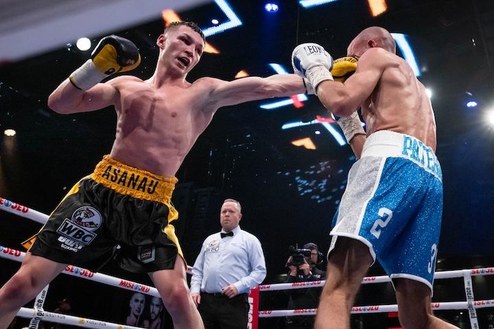 Dmiztry Asanau turns away Francesco Patera in landside decision win