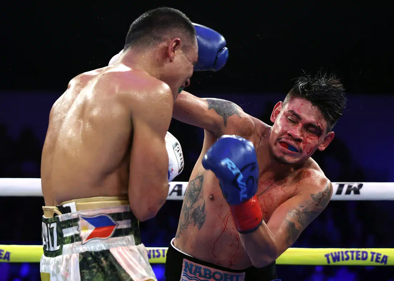 Bloodied Emanuel Navarrete Escapes With Controversial Win Over Courageous Underdog Charly Suarez