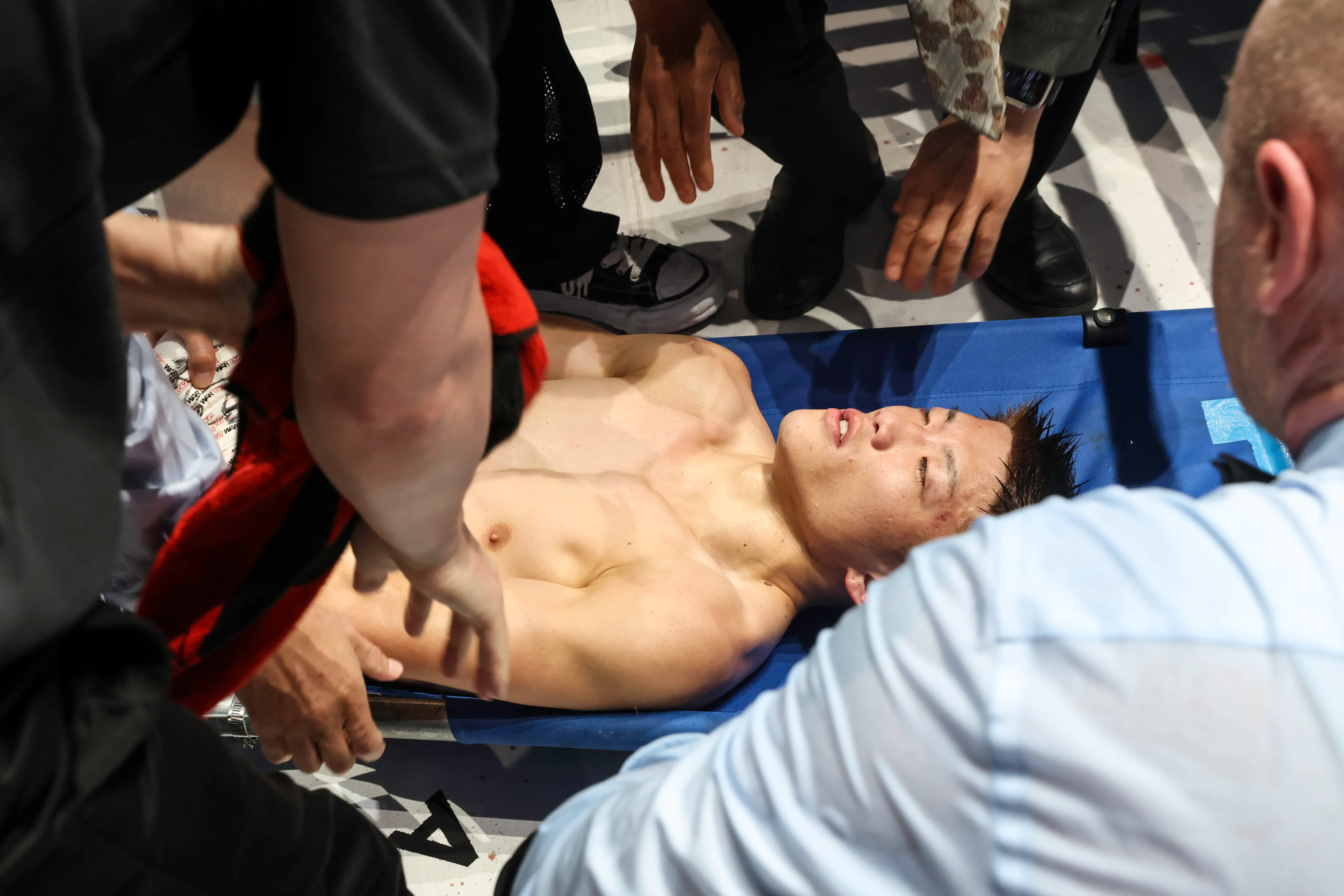 Ginjiro Shigeoka paralyzed on one side after brain injury but responding to hand signals