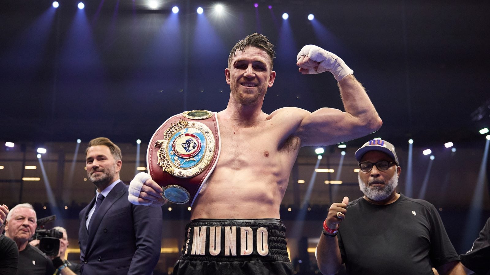 Callum Smith celebrates with his new Interim WBO World Light Heavyweight Title after defeating Joshua Buatsi
