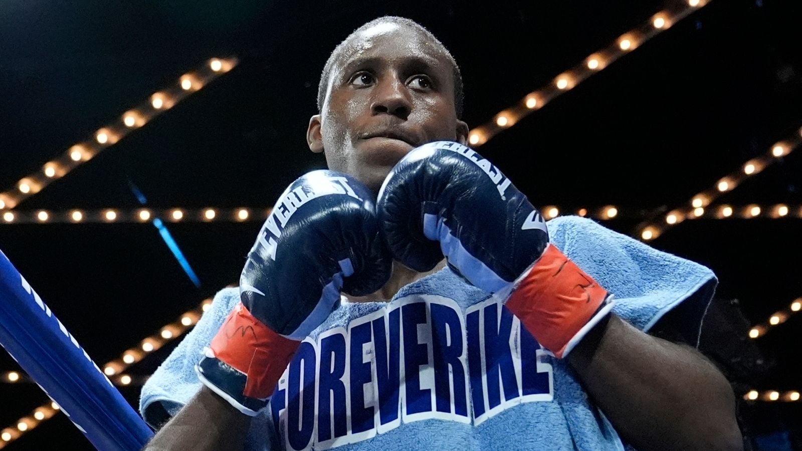 Carrington makes successful first defense of featherweight title