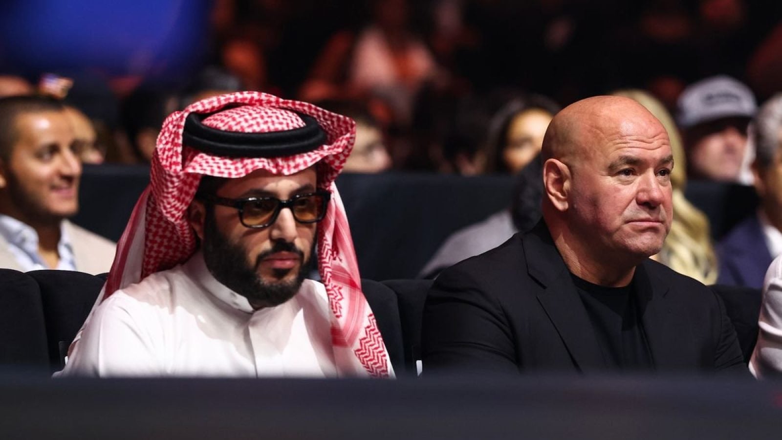 Turki Al-Sheikh and Dana White watch a bout on the undercard of the Canelo v Crawford event at Allegiant Stadium.
