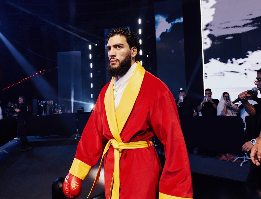 Hamzah Sheeraz ring-walks for his WBO title bout against Simon Zachenhuber.