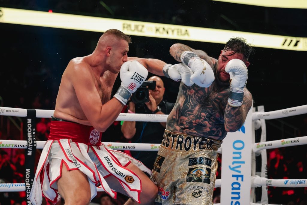 Damian Knyba exchanges punches with Andy Ruiz Jr. during their heavyweight contest.