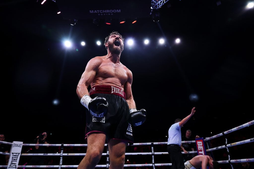 Pat Brown celebrates as the referee waves off his fight with John Hedges for the British and Commonwealth cruiserweight titles.
