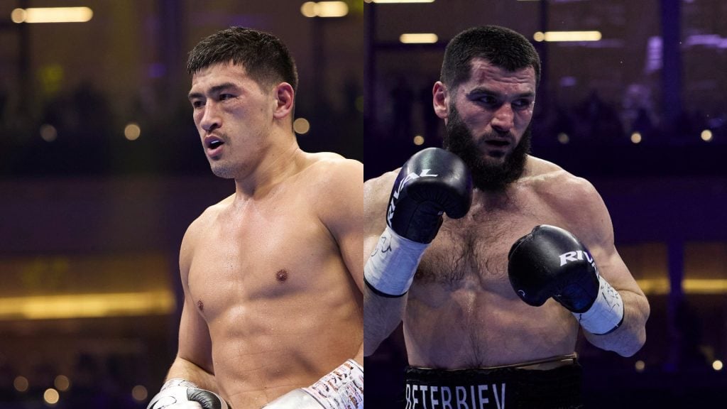 Dmitry Bivol during his fight against Artur Beterbiev for Undisputed Light Heavyweight boxing championship. / Artur Beterbiev faces Dmitry Bivol during their undisputed light-heavyweight title fight.
