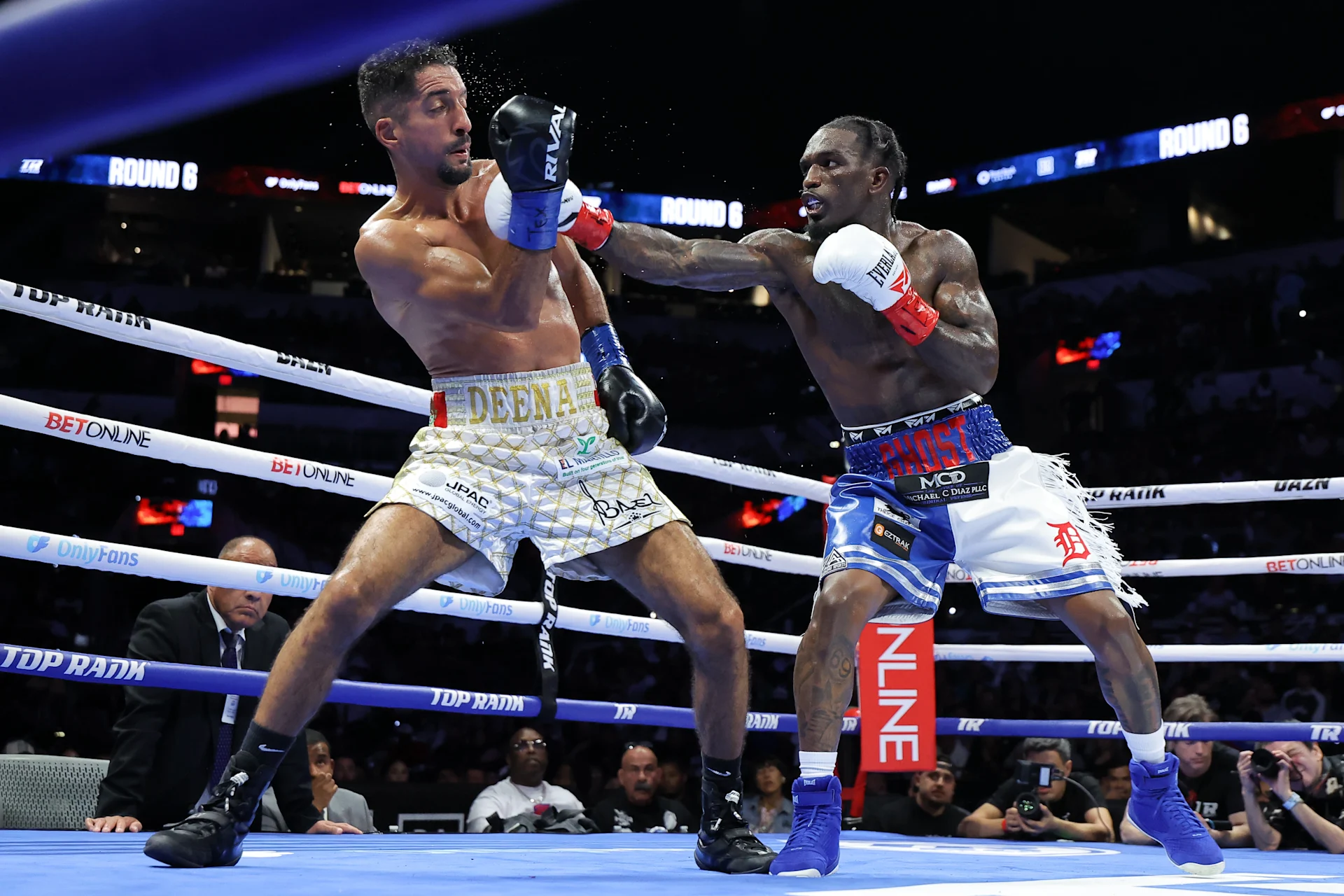 Frank Martin scores 7th-round stoppage of Zaina