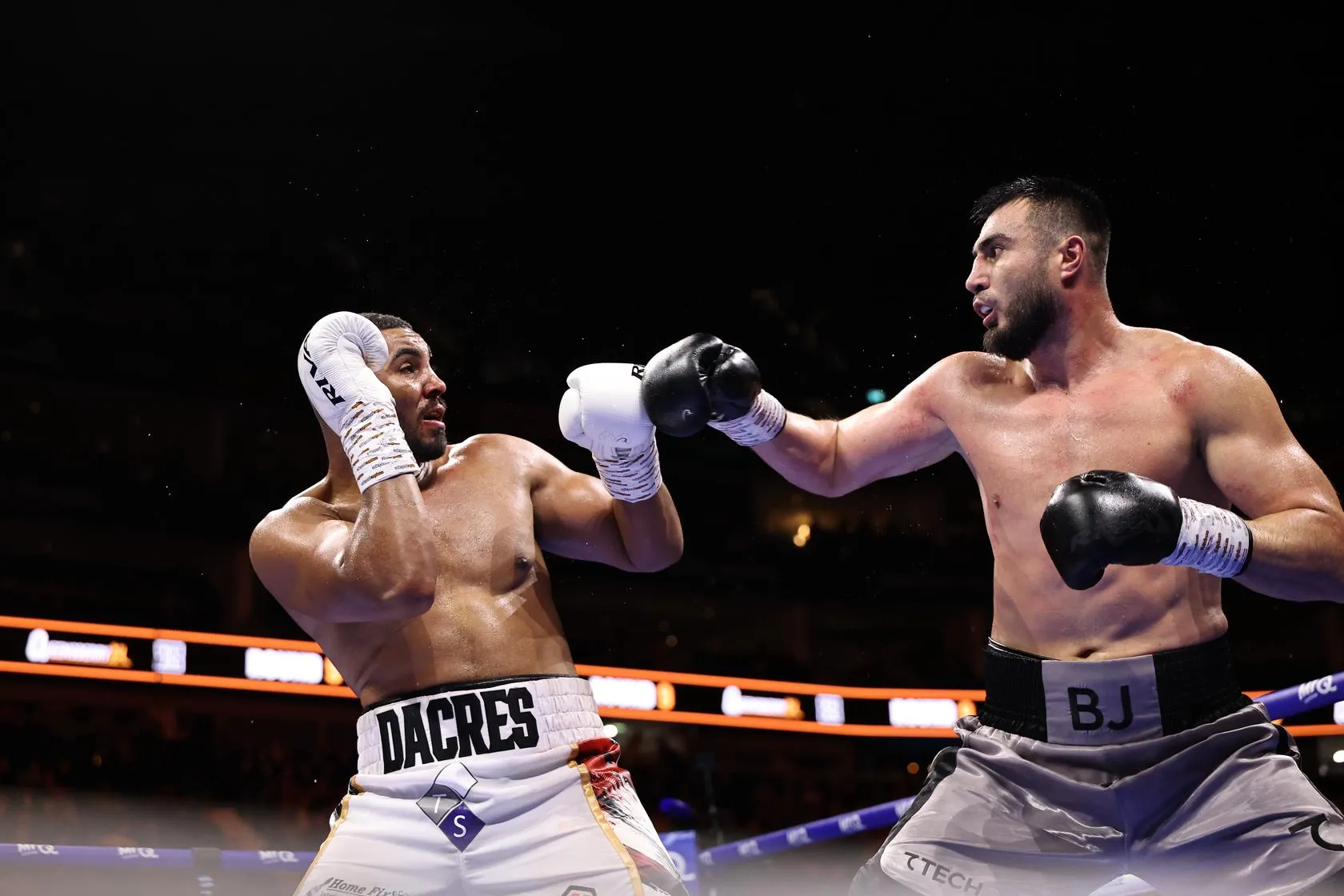 Bakhodir Jalolov drops Solomon Dacres but settles for points victory in London