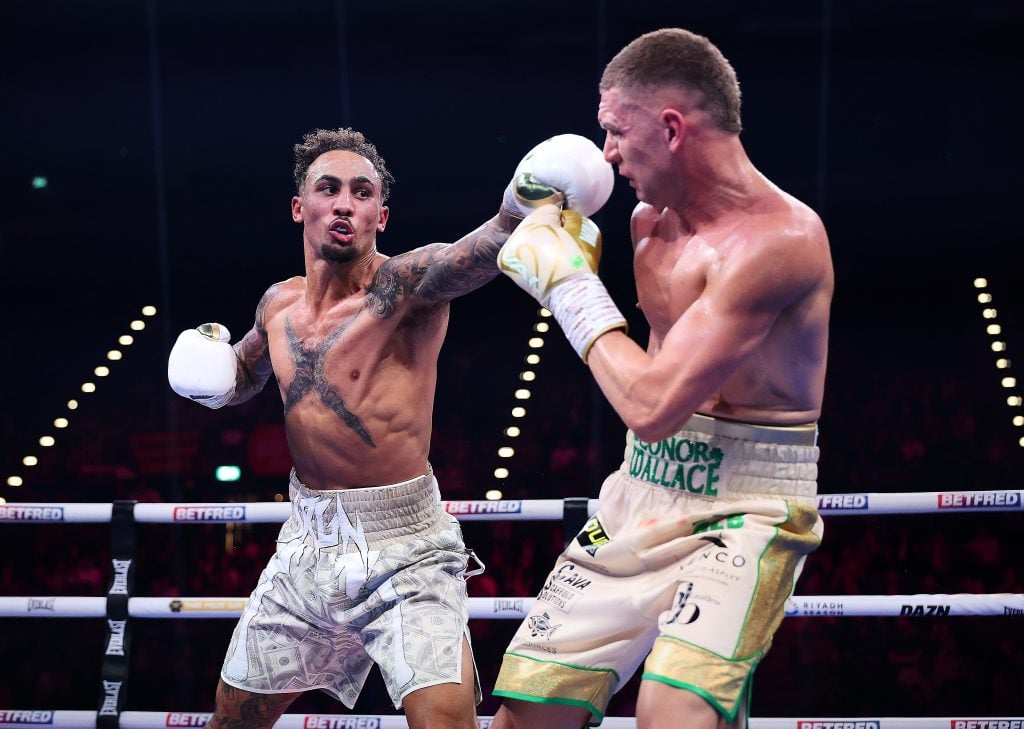 Ben Whittaker and Conor Wallace exchange punches during their IBF light-heavyweight final eliminator.