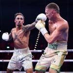 Ben Whittaker withstands Conor Wallace rally to earn Bivol mandatory shot