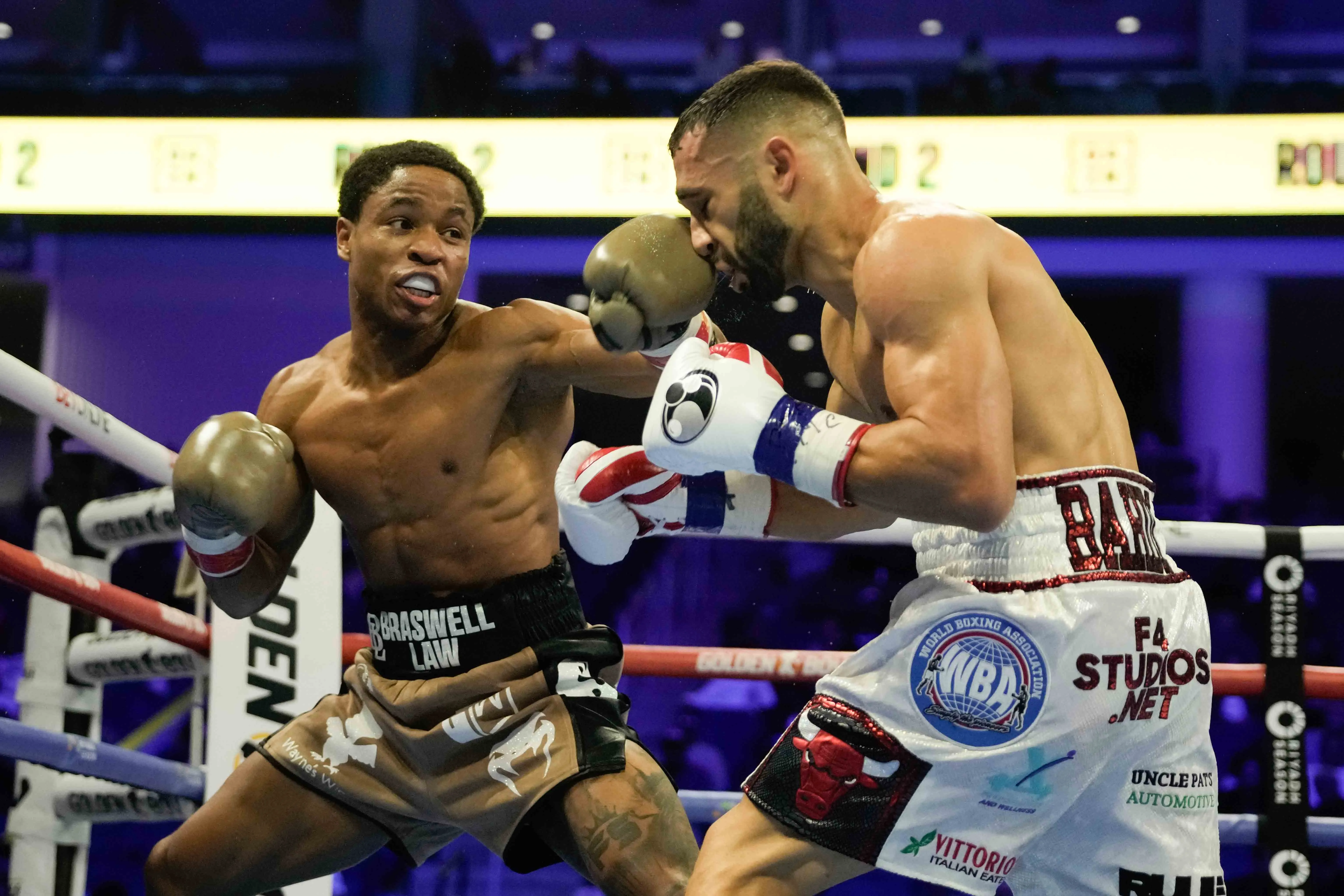 Floyd Schofield III collects WBA lightweight belt in gritty battle with Lucas Bahdi